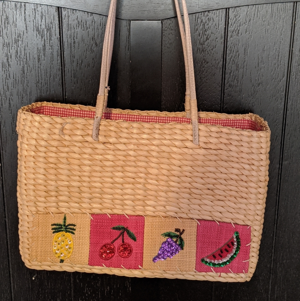 Purse with fruit embellishments